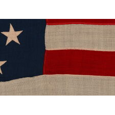 45 STAR ANTIQUE AMERICAN FLAG IN A SMALL AND DESIRABLE SCALE AMONG THOSE OF THE PERIOD WITH PIECED AND SEWN CONSTRUCTION, OFFICIAL FROM 1896-1908; MARKED ‘STANDARD”; SPANISH-AMERICAN WAR ERA, REFLECTS THE PERIOD WHEN UTAH WAS THE MOST RECENT STATE TO JOIN THE UNION