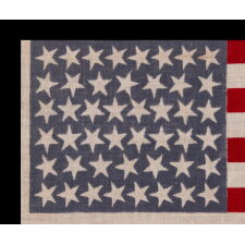 46 STAR ANTIQUE AMERICAN FLAG WITH VARIED STAR POSITIONING, A SCARCE AND BEAUTIFUL EXAMPLE; REFLECTS THE PERIOD WHEN OKLAHOMA WAS THE MOST RECENT STATE TO JOIN THE UNION, circa 1907-1912