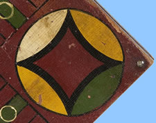 MASTERPIECE QUALITY AMERICAN PARCHEESI BOARD WITH CARRIAGE-PAINTED CENTER STAR, DIMINUTIVE SIZE, AND A BOLD COMBINATION OF SEVEN COLORS, CA 1870