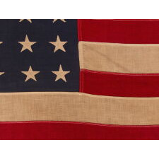 48 STAR, VINTAGE AMERICAN FLAG WITH AN EARLY “STORM KING” LABEL, ATTRIBUTED TO THE “OLD GLORY” FLAG CO. OF CHICAGO, OR COLLEGEVILLE FLAG & MFG. CO. OF PENNSYLVANIA, circa 1935-1950
