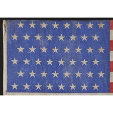 48 STARS IN STAGGERED ROWS ON A LARGE SCALE PARADE FLAG WITH A BRILLIANT, CORNFLOWER BLUE CANTON, 1896-1918