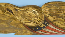 47-INCH, ELONGATED STERN BOARD EAGLE IN THE MANNER OF BELLAMY, WITH GILDED & PAINTED SURFACE, CA 1900