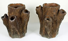 HUGE, MAGNIFICENT PAIR OF AMERICAN SEWER TILE PLANTERS IN THE FORM OF TREE TRUNKS