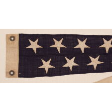 6-FOOT SHIP’S COMMISSION PENNANT WITH A 5.5” HOIST AND 13 STARS IN 2 STAGGERED ROWS, LIKELY PRODUCED FOR A PRIVATE VESSEL, circa 1892-1910