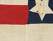 VERY RARE SEWN FLAG WITH 5 STARS ON A BLUE CALICO CANTON AND 8 STRIPES, MADE FOR THE 1860 CAMPAIGN OF ABRAHAM LINCOLN & HANNIBAL HAMLIN, WITH SPECIFIC HISTORY TO A PITTSBURG AREA FAMILY, SAID TO HAVE BEEN CARRIED IN A TORCHLIT PARADE
