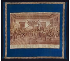 LARGE FORMAT, PRINTED COTTON KERCHIEF WITH IMAGE OF JOHN TRUMBULL'S "DECLARATION OF INDEPENDENCE" PLUS IDENTIFYING SIGNATURES, MADE FOR THE 1826 SEMICENTENNIAL, UNDOCUMENTED, THE ONLY KNOWN EXAMPLE IN THIS EXACT STYLE