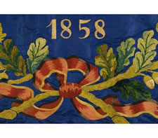 FABULOUS SILK EMBROIDERED UNION PRESENTATION FLAG OF THE CIVIL WAR PERIOD, WITH AN OUTSTANDING ILLUSTRATION OF AN EAGLE HOLDING A STARS & STRIPES THAT BEARS A VARIATION OF THE GREAT STAR PATTERN