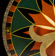 PENNSYLVANIA GAME WHEEL WITH STRIKING GRAPHICS, GREAT COLORS, AND WHIMSICAL BRASS SPINNER, 1890-1910