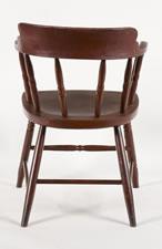 SET OF 12 BARREL-BACK WINDSOR CHAIRS, IN RED PAINT, WITH THE 3-LINK CHAIN (FRIENDSHIP, LOVE, AND TRUTH) OF THE ODD FELLOWS ON EACH CREST RAIL, CA 1850-70