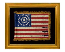 RARE AND BEAUTIFUL 38 STAR FLAG, AN INDIAN WARS PERIOD FLANK GUIDON OF THE 4th U.S. INFANTRY, WITH A MEDALLION CONFIGURATION SURROUNDING THE NUMERAL "4".  1876-1889, COLORADO STATEHOOD