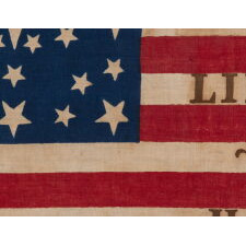 ANTIQUE AMERICAN FLAG MADE FOR THE 1860 PRESIDENTIAL CAMPAIGN OF ABRAHAM LINCOLN & HANNIBAL HAMLIN, WITH 31 STARS IN A FANCIFUL STARBURST OR ‘GREAT STAR-IN-A-SQUARE’ MEDALLION; ONE OF THE RAREST AND MOST GRAPHIC OF ALL CONFIGURATIONS THAT HAVE BEEN IDENTIFIED IN 19TH CENTURY EXAMPLES; THE ONLY KNOWN LINCOLN CAMPAIGN FLAG IN THIS STYLE, AND ONE OF JUST 3 PARADE FLAGS OF ANY SORT THAT SHARE THIS SPECTACULAR STAR ARRANGEMENT