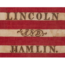 ANTIQUE AMERICAN FLAG MADE FOR THE 1860 PRESIDENTIAL CAMPAIGN OF ABRAHAM LINCOLN & HANNIBAL HAMLIN, WITH 31 STARS IN A FANCIFUL STARBURST OR ‘GREAT STAR-IN-A-SQUARE’ MEDALLION; ONE OF THE RAREST AND MOST GRAPHIC OF ALL CONFIGURATIONS THAT HAVE BEEN IDENTIFIED IN 19TH CENTURY EXAMPLES; THE ONLY KNOWN LINCOLN CAMPAIGN FLAG IN THIS STYLE, AND ONE OF JUST 3 PARADE FLAGS OF ANY SORT THAT SHARE THIS SPECTACULAR STAR ARRANGEMENT