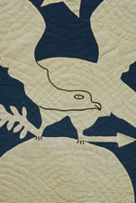 AN AMERICAN FOLK ART MASTERPIECE:  CIVIL WAR PERIOD AMERICAN FLAG QUILT WITH AN EAGLE PERCHED ON A GLOBE AMIDST 34 STARS, 1861-63, PROBABLY OF NEW YORK ORIGIN