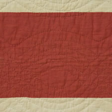 AN AMERICAN FOLK ART MASTERPIECE:  CIVIL WAR PERIOD AMERICAN FLAG QUILT WITH AN EAGLE PERCHED ON A GLOBE AMIDST 34 STARS, 1861-63, PROBABLY OF NEW YORK ORIGIN