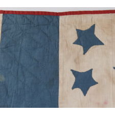 AMERICAN PATRIOTIC FLAG QUILT WITH 44 BLUE STARS SET UPON A WHITE GROUND IN THE TOP CENTER OF 13 RED, WHITE, AND BLUE STRIPES, 1890-1896, WYOMING STATEHOOD