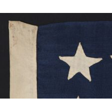 ANTIQUE 38 STAR FLAG WITH HAND-SEWN STARS, IN A SMALL SCALE AMONG PIECED-AND-SEWN EXAMPLES, WITH WONDERFUL FOLK QUALITIES, COLORADO STATEHOOD, 1876-1889