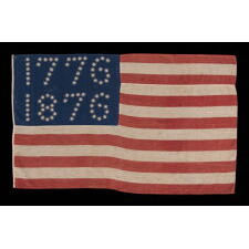 ANTIQUE AMERICAN FLAG WITH 10-POINTED STARS THAT SPELL “1776 – 1876”, MADE FOR THE 100-YEAR ANNIVERSARY OF AMERICAN INDEPENDENCE, ONE OF THE MOST GRAPHIC OF ALL EARLY EXAMPLES