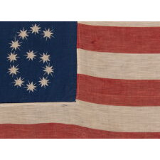 ANTIQUE AMERICAN FLAG WITH 10-POINTED STARS THAT SPELL “1776 – 1876”, MADE FOR THE 100-YEAR ANNIVERSARY OF AMERICAN INDEPENDENCE, ONE OF THE MOST GRAPHIC OF ALL EARLY EXAMPLES
