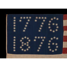 ANTIQUE AMERICAN FLAG WITH 10-POINTED STARS THAT SPELL “1776 – 1876”, MADE FOR THE 100-YEAR ANNIVERSARY OF AMERICAN INDEPENDENCE, ONE OF THE MOST GRAPHIC OF ALL EARLY EXAMPLES