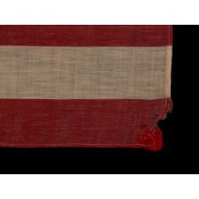 ANTIQUE AMERICAN FLAG WITH 10-POINTED STARS THAT SPELL “1776 – 1876”, MADE FOR THE 100-YEAR ANNIVERSARY OF AMERICAN INDEPENDENCE, ONE OF THE MOST GRAPHIC OF ALL EARLY EXAMPLES