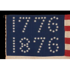 ANTIQUE AMERICAN FLAG WITH 10-POINTED STARS THAT SPELL “1776 – 1876”, MADE FOR THE 100-YEAR ANNIVERSARY OF AMERICAN INDEPENDENCE, ONE OF THE MOST GRAPHIC OF ALL EARLY EXAMPLES