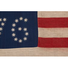 ANTIQUE AMERICAN FLAG WITH 10-POINTED STARS THAT SPELL “1776 – 1876”, MADE FOR THE 100-YEAR ANNIVERSARY OF AMERICAN INDEPENDENCE, ONE OF THE MOST GRAPHIC OF ALL EARLY EXAMPLES
