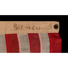 ANTIQUE AMERICAN FLAG WITH 13 HAND-SEWN STARS IN A 3-2-3-2-3 CONFIGURATION, MADE IN THE ERA OF THE 1876 CENTENNIAL OF AMERICAN INDEPENDENCE, IN AN EXTRAORDINARY AND VERY DESIRABLE SIZE AMONG ITS COUNTERPARTS