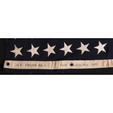 ANTIQUE AMERICAN FLAG WITH 48 STARS, A U.S. NAVY SMALL BOAT ENSIGN, MADE DURING WWII, IN DECEMBER OF 1943, AT MARE ISLAND, CALIFORNIA, HEADQUARTERS OF THE PACIFIC FLEET, SIGNED & DATED