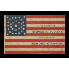ANTIQUE AMERICAN FLAG MADE FOR THE 1860 PRESIDENTIAL CAMPAIGN OF NORTHERN DEMOCRAT CANDIDATES STEPHEN DOUGLAS & HERSCHEL JOHNSON, WITH 31 STARS CONFIGURED IN A RARE MEDALLION VARIANT THAT FEATURES A TEARDROP-LIKE FORMATION SET WITHIN A CIRCULAR WREATH, THE ONLY KNOWN EXAMPLE IN THIS STYLE