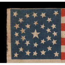 ANTIQUE AMERICAN FLAG MADE FOR THE 1860 PRESIDENTIAL CAMPAIGN OF NORTHERN DEMOCRAT CANDIDATES STEPHEN DOUGLAS & HERSCHEL JOHNSON, WITH 31 STARS CONFIGURED IN A RARE MEDALLION VARIANT THAT FEATURES A TEARDROP-LIKE FORMATION SET WITHIN A CIRCULAR WREATH, THE ONLY KNOWN EXAMPLE IN THIS STYLE
