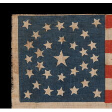ANTIQUE AMERICAN FLAG MADE FOR THE 1860 PRESIDENTIAL CAMPAIGN OF NORTHERN DEMOCRAT CANDIDATES STEPHEN DOUGLAS & HERSCHEL JOHNSON, WITH 31 STARS CONFIGURED IN A RARE MEDALLION VARIANT THAT FEATURES A TEARDROP-LIKE FORMATION SET WITHIN A CIRCULAR WREATH, THE ONLY KNOWN EXAMPLE IN THIS STYLE