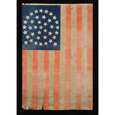 ANTIQUE AMERICAN PARADE FLAG WITH 38 STARS IN A MEDALLION CONFIGURATION WITH 2 OUTLIERS, COLORADO STATEHOOD, 1876-1889, A LARGE, BOLD EXAMPLE