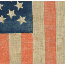 ANTIQUE AMERICAN PARADE FLAG WITH 38 STARS IN A MEDALLION CONFIGURATION WITH 2 OUTLIERS, COLORADO STATEHOOD, 1876-1889, A LARGE, BOLD EXAMPLE