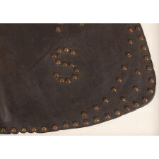 ANTIQUE, BATWING, LEATHER CHAPS WITH GREAT PATINA AND “TEXAS” SPELLED OUT IN THE STUDS, circa 1915-1930