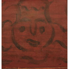 QUEEN ANNE PERIOD BLANKET CHEST, CONNECTICUT RIVER VALLEY, PROBABLY MASSACHUSETTS, WITH BLACK DECORATION ON A RED GROUND THAT INCLUDES TWO WHIMSICAL FACES, ca 1740-1760