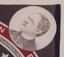 BOLD AND COLORFUL KERCHIEF WITH A ROUND PATRIOTIC SHIELD, MADE FOR THE 1888 PRESIDENTIAL CAMPAIGN OF WILLIAM HENRY HARRISON AND LEVI MORTON