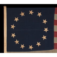13 STAR ANTIQUE AMERICAN FLAG IN THE BETSY ROSS PATTERN, ONE OF JUST THREE EXAMPLES THAT I HAVE ENCOUNTERED THAT PRE-DATE THE 1890’s; AN EXTRAORDINARY FIND, CIVIL WAR PERIOD (1861-1865) OR JUST AFTER, EXTREMELY LARGE AMONG ITS COUNTERPARTS OF ALL PERIODS IN THIS DESIGN