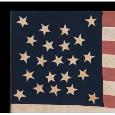 22 STAR ANTIQUE AMERICAN FLAG OF THE CIVIL WAR ERA; A SOUTHERN-EXCLUSIONARY COUNT ARRANGED IN A DOUBLE-WREATH MEDALLION CONFIGURATION; HOMEMADE OF WOOL AND COTTON; A RARE STAR COUNT IN ANY PERIOD; EXHIBITED AT THE MUSEUM OF THE AMERICAN REVOLUTION FROM JUNE – SEPTEMBER, 2021
