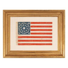35 STAR ANTIQUE AMERICAN PARADE FLAG WITH A DOUBLE-WREATH STYLE MEDALLION CONFIGURATION OF STARS, PERHAPS THE BEST SURVIVING EXAMPLE IN THIS RARE FORM, CIVIL WAR PERIOD, WEST VIRGINIA STATEHOOD, 1863-1865
