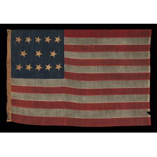 ANTIQUE AMERICAN FLAG WITH 13 HAND-SEWN STARS IN AN EXTREMELY RARE LINEAL CONFIGURATION OF 5-3-5, PROBABLY MADE WITH THE INTENT OF USE BY LOCAL MILITIA OR PRIVATE OUTFITTING OF A VOLUNTEER COMPANY, CIVIL WAR PERIOD, 1861-1865; EXHIBITED AT THE MUSEUM OF THE AMERICAN REVOLUTION FROM JUNE – JULY, 2019