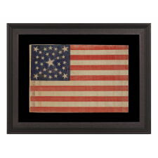 30 STARS ON AN ANTIQUE AMERICAN FLAG OF THE PRE-CIVIL WAR ERA, RARE AND BEAUTIFUL, WITH A MEDALLION CONFIGURATION THAT FEATURES A HALOED CENTER STAR, WISCONSIN STATEHOOD, 1848-1850