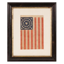 33 STARS IN A DOUBLE-WREATH CONFIGURATION, ON AN ANTIQUE AMERICAN FLAG DATING IMMEDIATELY PRE-CIVIL WAR THROUGH THE WAR'S OPENING YEAR, REFLECTS THE ADDITION OF OREGON TO THE UNION, 1859-1861