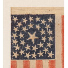 33 STARS IN A DOUBLE-WREATH CONFIGURATION, ON AN ANTIQUE AMERICAN FLAG DATING IMMEDIATELY PRE-CIVIL WAR THROUGH THE WAR'S OPENING YEAR, REFLECTS THE ADDITION OF OREGON TO THE UNION, 1859-1861
