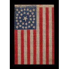 33 STARS IN A DOUBLE-WREATH CONFIGURATION, ON AN ANTIQUE AMERICAN FLAG DATING IMMEDIATELY PRE-CIVIL WAR THROUGH THE WAR'S OPENING YEAR, REFLECTS THE ADDITION OF OREGON TO THE UNION, 1859-1861