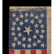 33 STARS IN A DOUBLE-WREATH CONFIGURATION, ON AN ANTIQUE AMERICAN FLAG DATING IMMEDIATELY PRE-CIVIL WAR THROUGH THE WAR'S OPENING YEAR, REFLECTS THE ADDITION OF OREGON TO THE UNION, 1859-1861