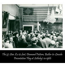 37 STARS IN A VERY RARE DIAMOND CONFIGURATION, WITH PILLARS OF STARS ON EITHER SIDE, NEARLY IDENTICAL TO A LARGER EXAMPLE PRESENTED BY CIVIL WAR GENERAL BENJAMIN BUTLER TO PRESIDENT LINCOLN AS THE FIRST AMERICAN FLAG EVER CONSTRUCTED OF ENTIRELY AMERICAN-MADE MATERIALS, JUST 3 DAYS PRIOR TO HIS 1865 ASSASSINATION; THIS STAR COUNT ANTICIPATORY TO THE FUTURE ADDITION OF NEBRASKA
