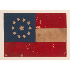 CONFEDERATE FIRST NATIONAL PATTERN FLAG (a.k.a., STARS & BARS) WITH 11 STARS, IN A TINY SIZE AMONG THOSE WITH PIECED AND SEWN CONSTRUCTION, A HOMEMADE, CIVIL WAR-PERIOD FLAG, FOUND IN GREATER BALTIMORE, LIKELY DISPLAYED FROM A PODIUM, PARADE FLOAT, CARRIAGE, OR STOREFRONT, circa MAY – NOV., 1861