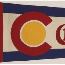 COLORADO PENNANT IN THE FORM OF THE COLORADO STATE FLAG, MADE IN DENVER BY M. SILVERMAN BETWEEN 1913 AND 1916, IMMEDIATELY FOLLOWING THE 1911 CREATION AND ADOPTION OF THE DESIGN