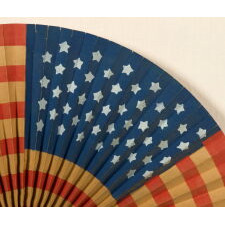 DRAMATIC, CIRCULAR FLAG FAN OF UNCOMMONLY HUGE SIZE, WITH UNUSUAL CONSTRUCTION, MADE IN THE WWI ERA (1917-18), CAREFULLY CONSERVED AND PRESENTED IN A DEEP, CUSTOM-MADE SHADOWBOX