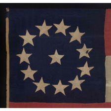 ENTIRELY HAND-SEWN CONFEDERATE 1ST NATIONAL (STARS & BARS) PATTERN FLAG WITH AN UNUSUAL COUNT OF 12 STARS TO REFLECT THE SECESSION OF MISSOURI IN 1861, IN A SMALL, DESIRABLE SCALE